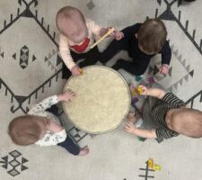 Infants drumming